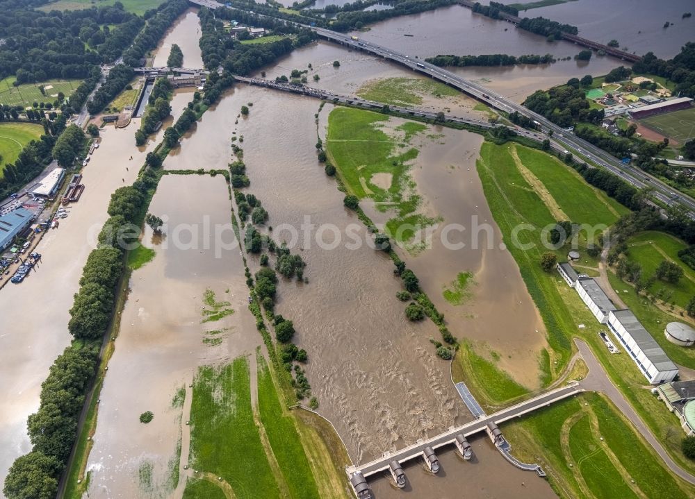 Aerial image Oberhausen - Flood situation and flooding, all-rousing and infrastructure-destroying masses of brown water on the curve of the Ruhr loop in Oberhausen at Ruhrgebiet in the state North Rhine-Westphalia, Germany