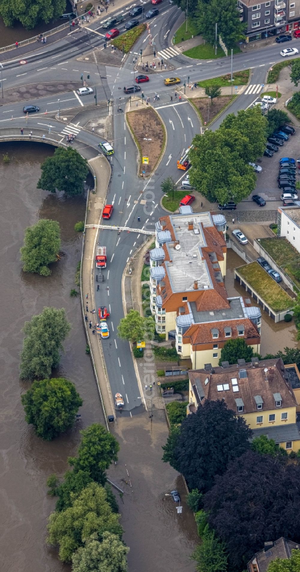 Essen from above - Flood situation and flooding, all-rousing and infrastructure-destroying masses of brown water on Laupendahler Landstrasse in the district Werden in Essen at Ruhrgebiet in the state North Rhine-Westphalia, Germany