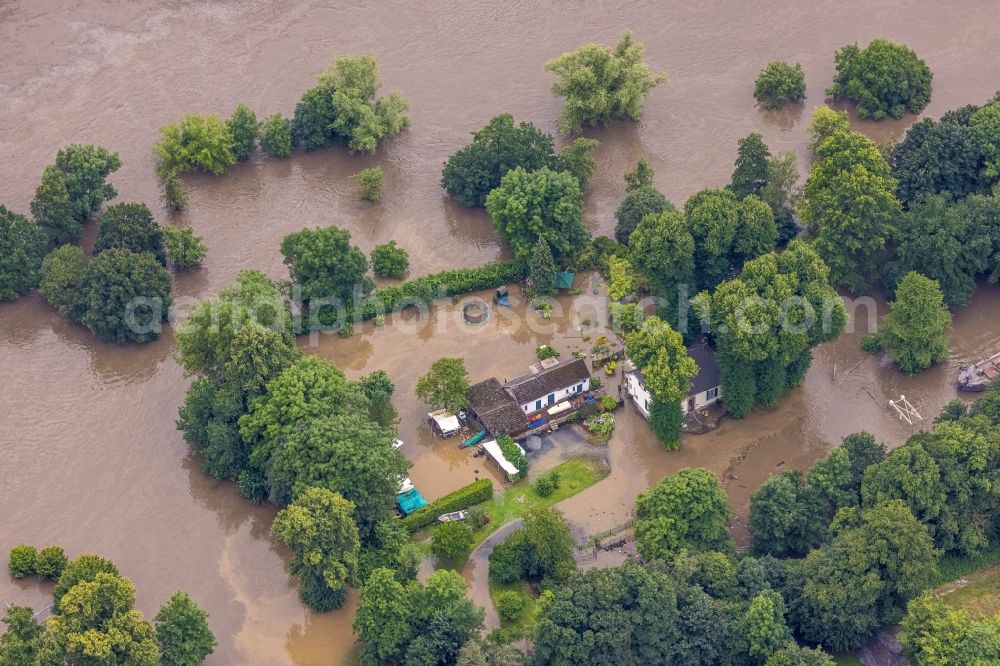 Essen from above - Flood situation and flooding, all-rousing and infrastructure-destroying masses of brown water on Papiermuehlenschleuse in the district Werden in Essen at Ruhrgebiet in the state North Rhine-Westphalia, Germany