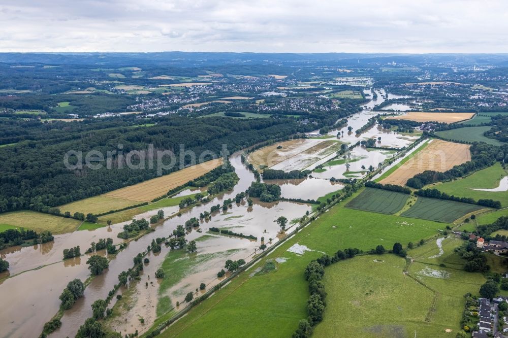 Aerial photograph Schwerte - Flood situation and flooding, all-rousing and infrastructure-destroying masses of brown water on Ruhr in Schwerte in the state North Rhine-Westphalia, Germany