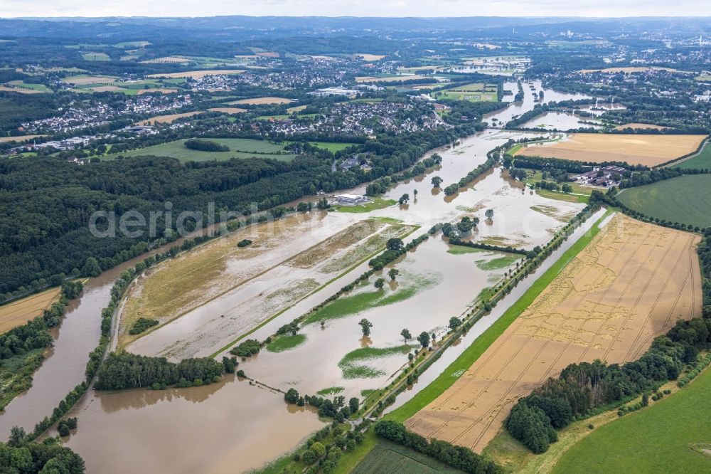 Schwerte from above - Flood situation and flooding, all-rousing and infrastructure-destroying masses of brown water on Ruhr in Schwerte in the state North Rhine-Westphalia, Germany