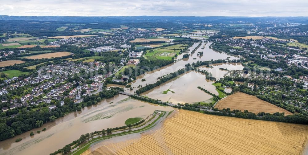 Schwerte from above - Flood situation and flooding, all-rousing and infrastructure-destroying masses of brown water on Ruhr in Schwerte in the state North Rhine-Westphalia, Germany