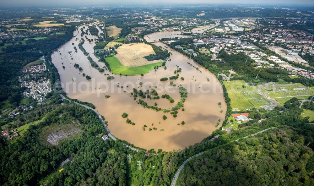 Hattingen from above - Flood situation and flooding, all-rousing and infrastructure-destroying masses of brown water at the loop of the river course of the Ruhr in Hattingen at Ruhrgebiet in the state North Rhine-Westphalia, Germany