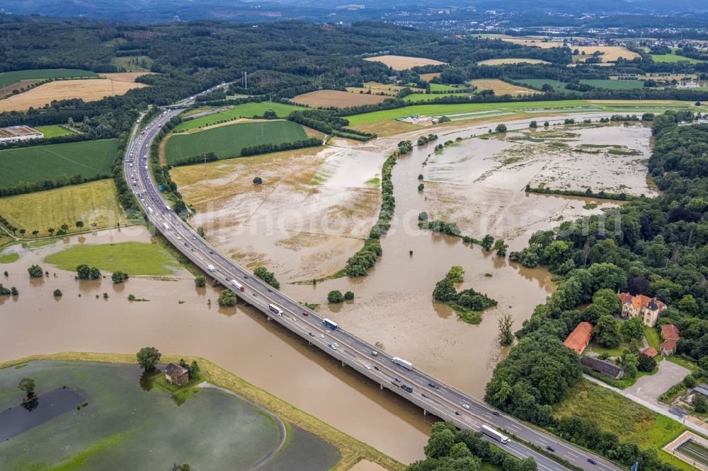 Schwerte from above - Flood situation and flooding, all-rousing and infrastructure-destroying masses of brown water Schwerte Ergste Autobahnbruecke E41 in Schwerte at Ruhrgebiet in the state North Rhine-Westphalia, Germany