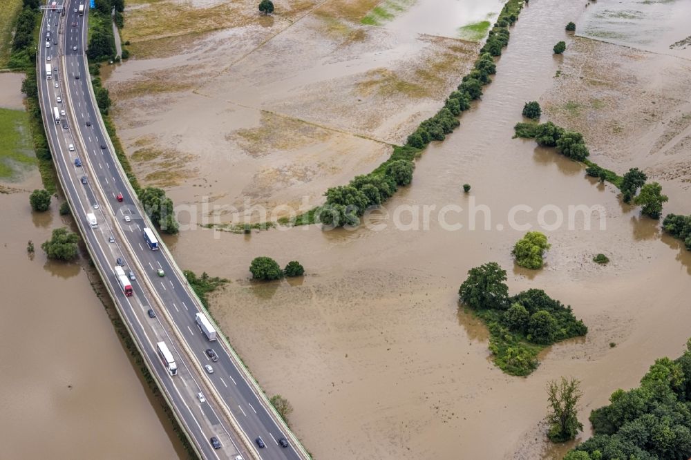 Aerial image Schwerte - Flood situation and flooding, all-rousing and infrastructure-destroying masses of brown water Schwerte Ergste Autobahnbruecke E41 in Schwerte at Ruhrgebiet in the state North Rhine-Westphalia, Germany