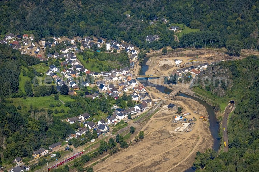 Altenahr from above - Flood damage and reconstruction construction sites in the floodplain on shore of Ahr in Altenahr in the state Rhineland-Palatinate, Germany