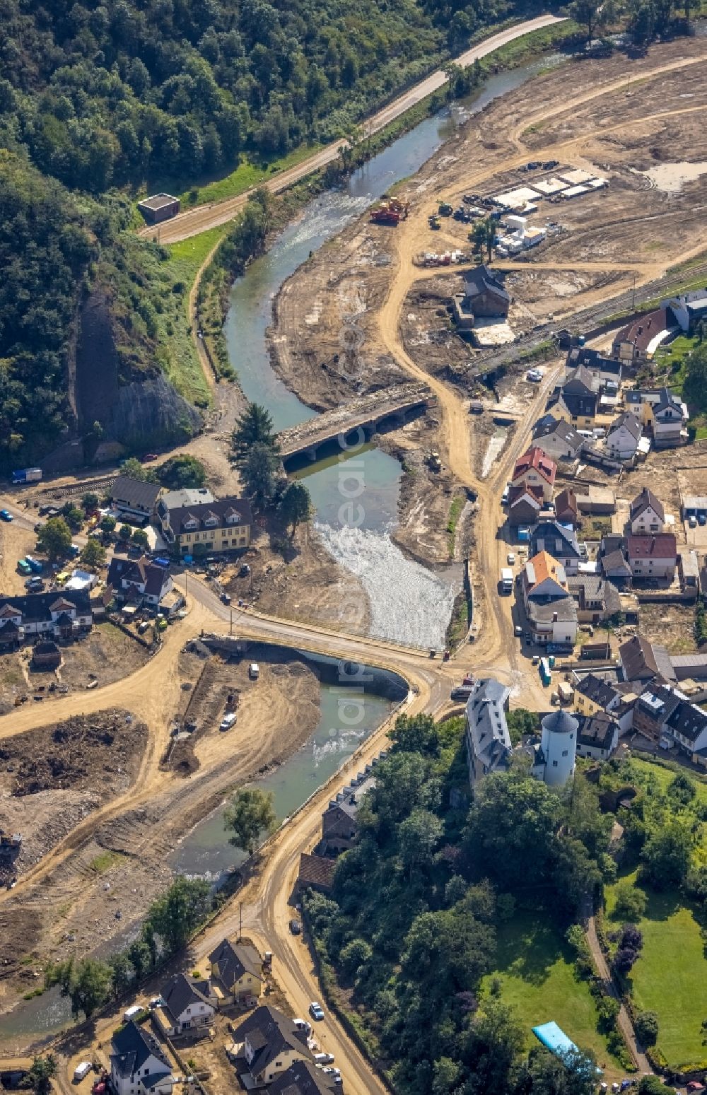 Altenahr from the bird's eye view: Flood damage and reconstruction construction sites in the floodplain on shore of Ahr in Altenahr in the state Rhineland-Palatinate, Germany