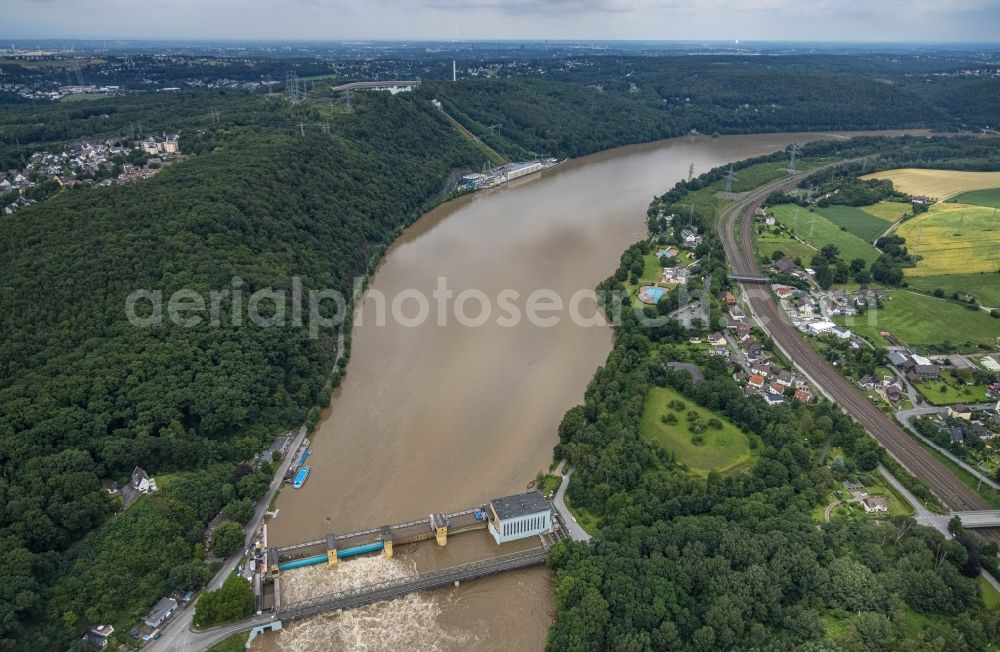 Herdecke from the bird's eye view: Flood situation and flooding, all-rousing and infrastructure-destroying masses of brown water on the banks of the Ruhr in Herdecke in the state North Rhine-Westphalia, Germany