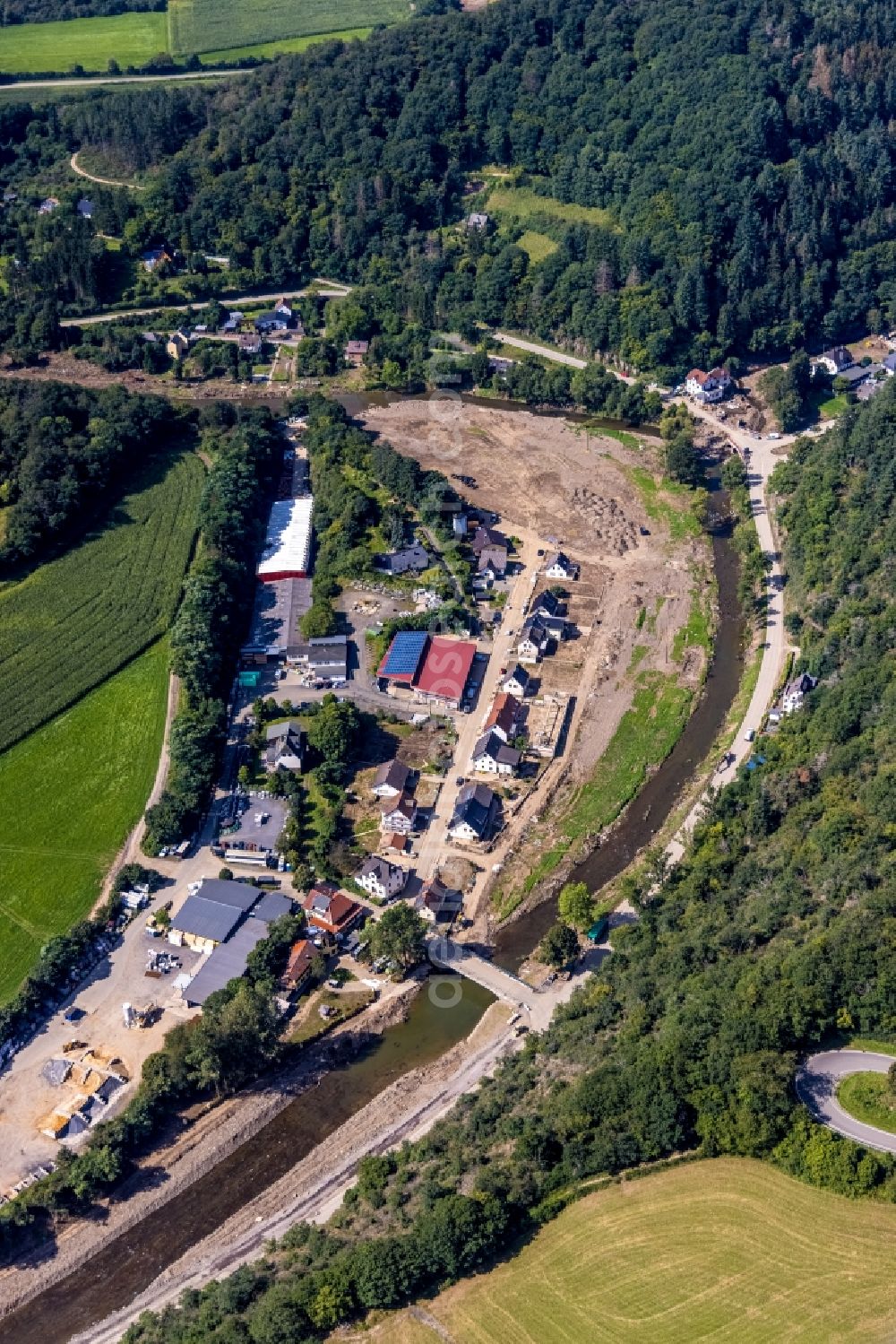 Aerial image Schuld - Flood damage and reconstruction construction sites in the floodplain on curse of Ahr in Schuld in the state Rhineland-Palatinate, Germany