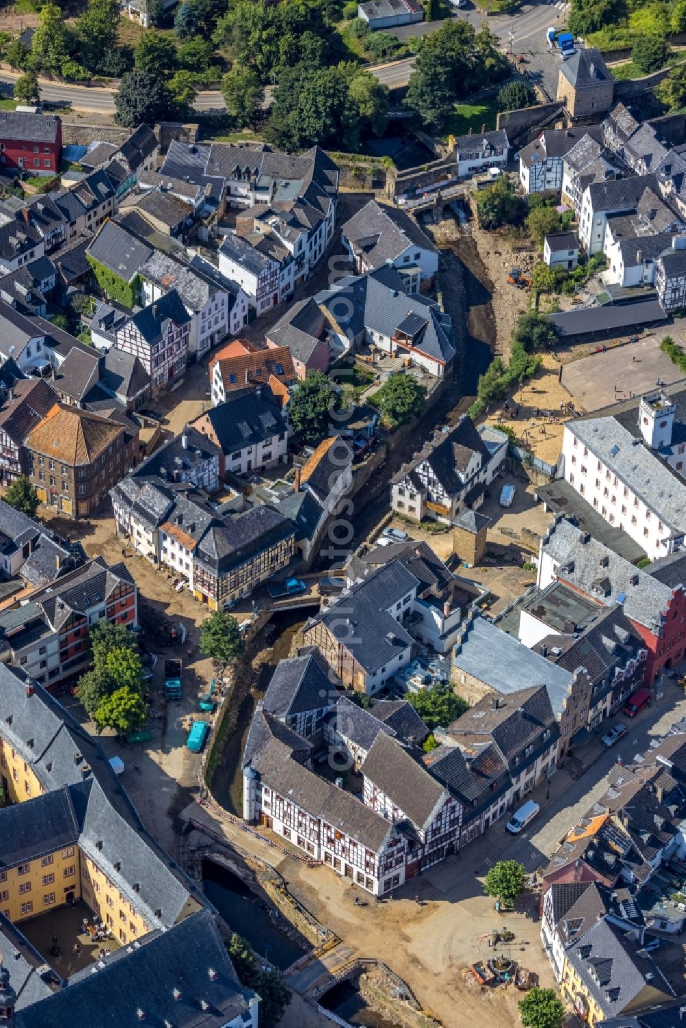 Aerial image Bad Münstereifel - Flood damage and reconstruction construction sites in the floodplain on riverside of Erft in Bad Muenstereifel in the state North Rhine-Westphalia, Germany