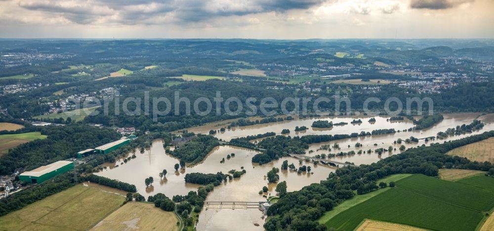 Aerial image Hattingen - Flood situation and flooding, all-rousing and infrastructure-destroying masses of brown water on the course of the Ruhr in Hattingen at Ruhrgebiet in the state North Rhine-Westphalia, Germany