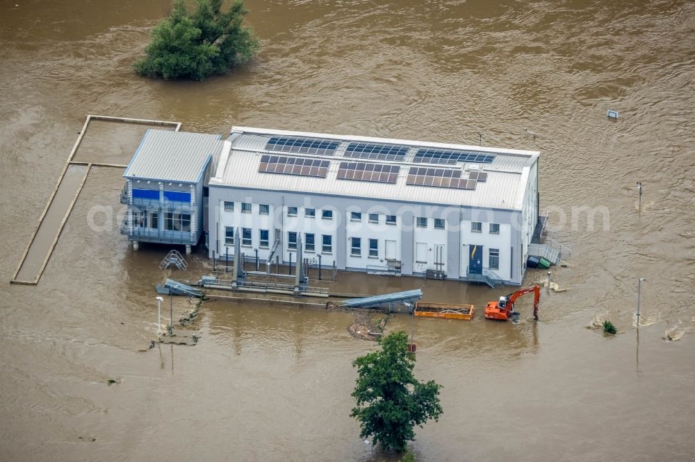 Hattingen from above - Flood situation and flooding, all-rousing and infrastructure-destroying masses of brown water on the course of the Ruhr in Hattingen at Ruhrgebiet in the state North Rhine-Westphalia, Germany