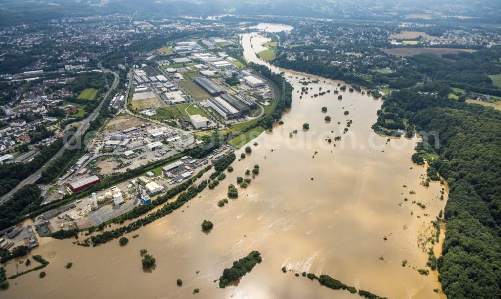 Aerial photograph Hattingen - Flood situation and flooding, all-rousing and infrastructure-destroying masses of brown water on the course of the Ruhr in Hattingen at Ruhrgebiet in the state North Rhine-Westphalia, Germany