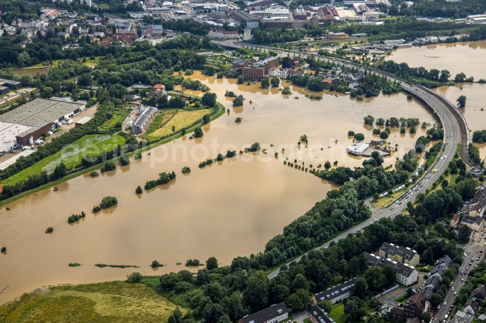 Aerial photograph Hattingen - Flood situation and flooding, all-rousing and infrastructure-destroying masses of brown water on the course of the Ruhr in Hattingen at Ruhrgebiet in the state North Rhine-Westphalia, Germany