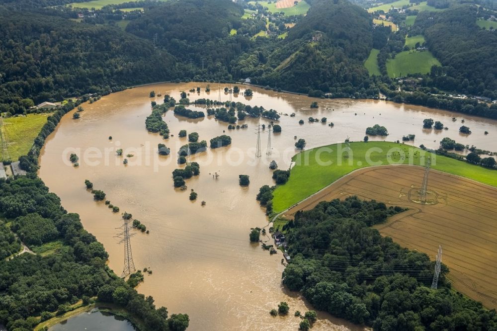 Hattingen from above - Flood situation and flooding, all-rousing and infrastructure-destroying masses of brown water on the course of the Ruhr in Hattingen at Ruhrgebiet in the state North Rhine-Westphalia, Germany