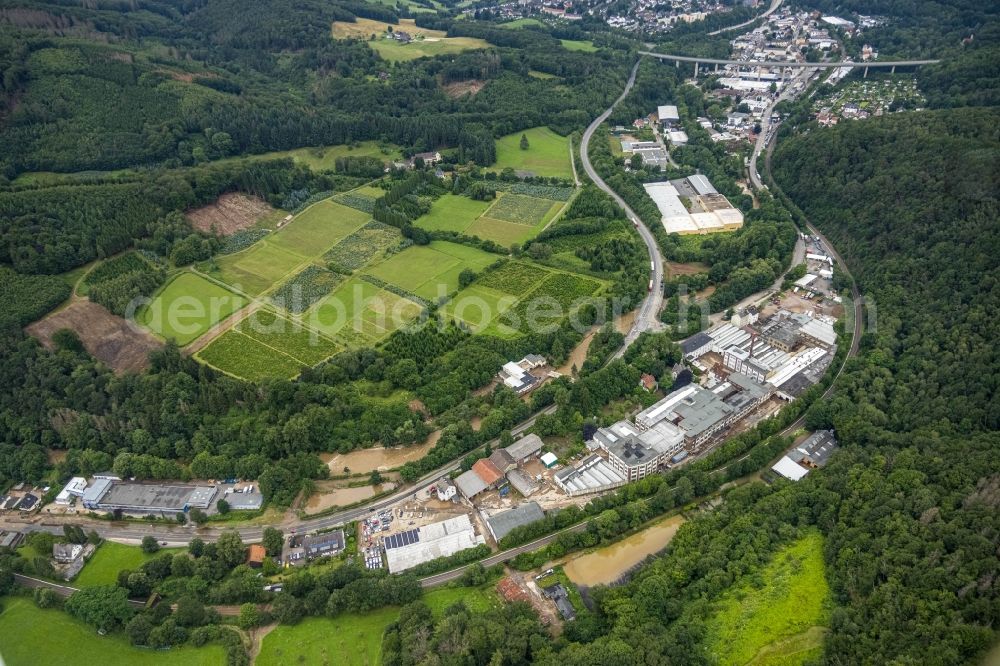 Aerial photograph Hagen - Flood situation and flooding, all-rousing and infrastructure-destroying masses of brown water on the course of the Ruhr and Volme in Hagen at Ruhrgebiet in the state North Rhine-Westphalia, Germany