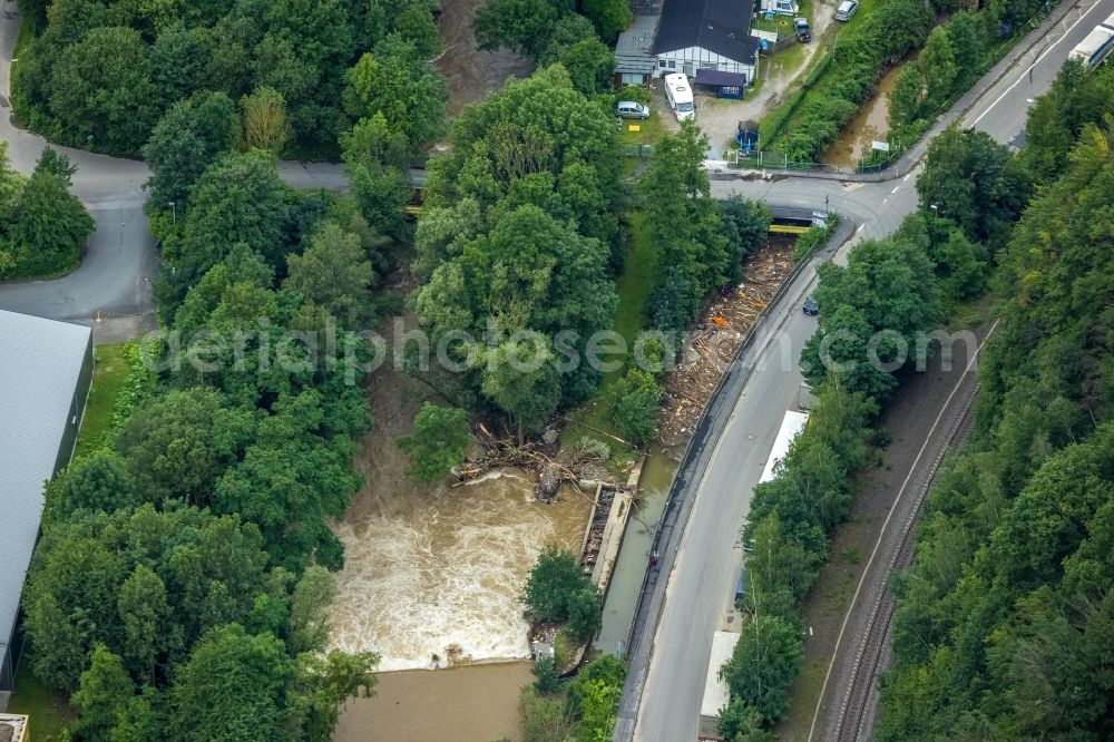 Hagen from above - Flood situation and flooding, all-rousing and infrastructure-destroying masses of brown water on the course of the Ruhr and Volme in Hagen at Ruhrgebiet in the state North Rhine-Westphalia, Germany