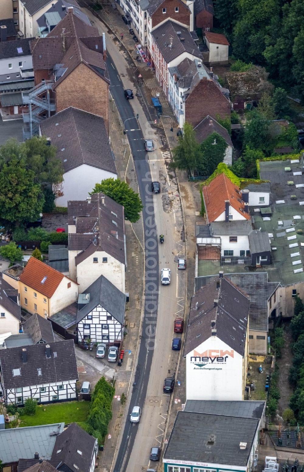 Hagen from above - Flood situation and flooding, all-rousing and infrastructure-destroying masses of brown water on the course of the Ruhr and Volme in Hagen at Ruhrgebiet in the state North Rhine-Westphalia, Germany