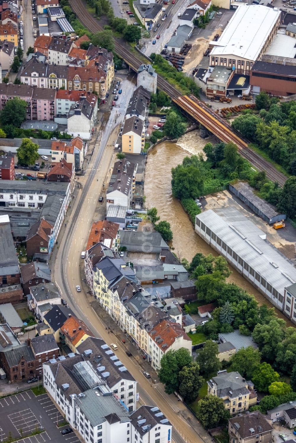 Aerial photograph Hagen - Flood situation and flooding, all-rousing and infrastructure-destroying masses of brown water on the course of the Ruhr and Volme in Hagen at Ruhrgebiet in the state North Rhine-Westphalia, Germany