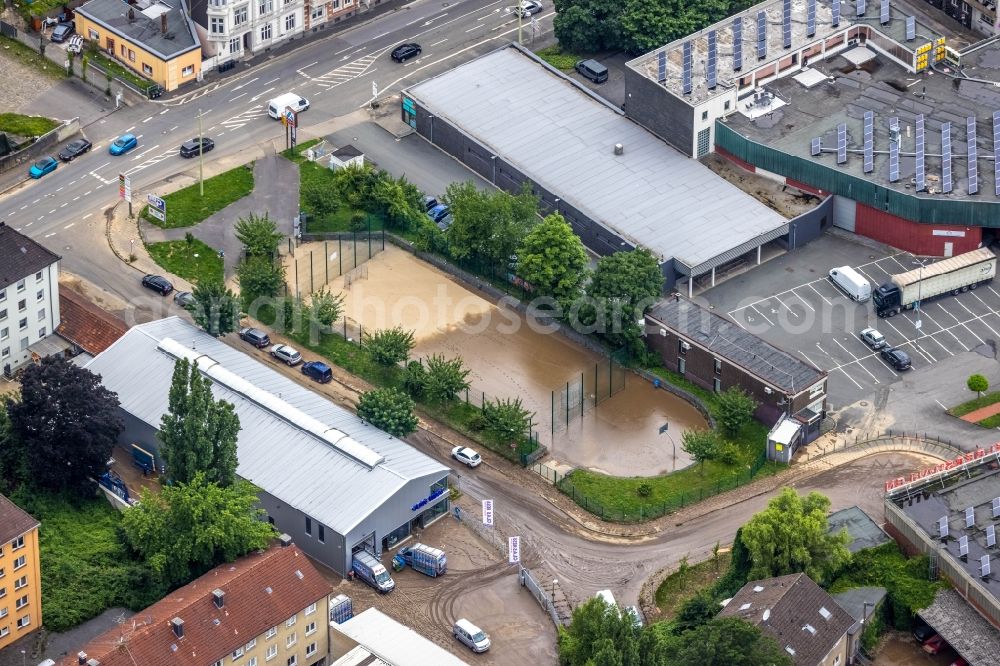 Hagen from above - Flood situation and flooding, all-rousing and infrastructure-destroying masses of brown water on the course of the Ruhr and Volme in Hagen at Ruhrgebiet in the state North Rhine-Westphalia, Germany