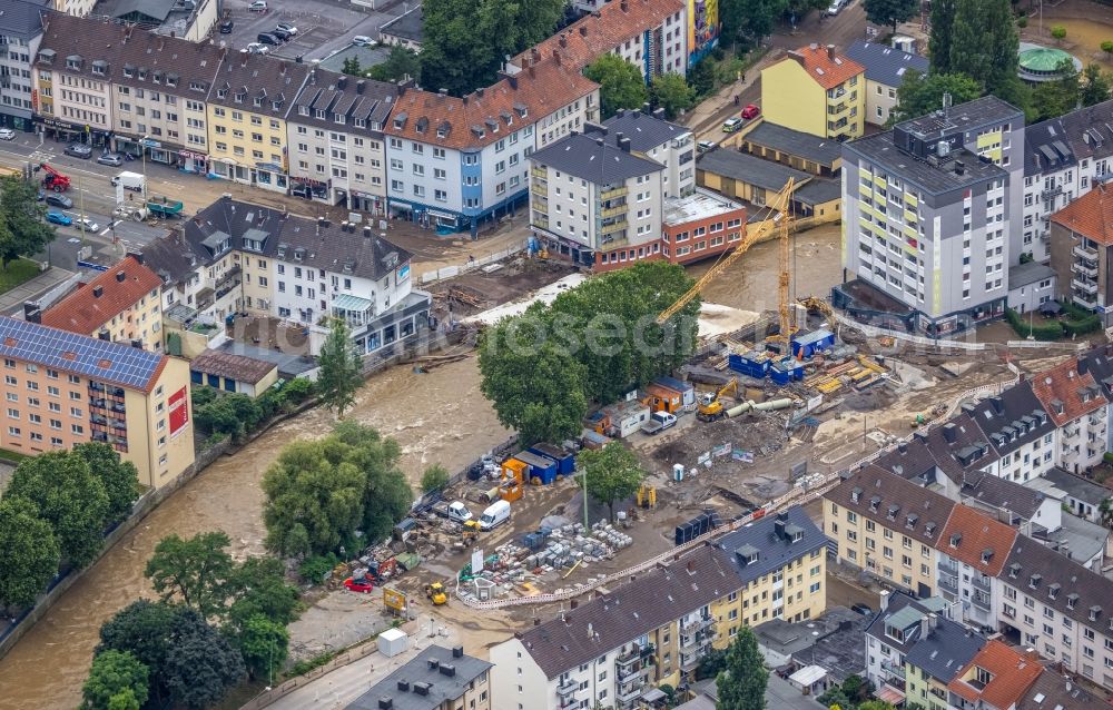 Hagen from the bird's eye view: Flood situation and flooding, all-rousing and infrastructure-destroying masses of brown water on the course of the Ruhr and Volme in Hagen at Ruhrgebiet in the state North Rhine-Westphalia, Germany