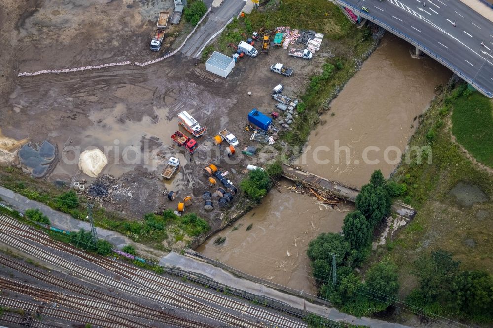 Aerial image Hagen - Flood situation and flooding, all-rousing and infrastructure-destroying masses of brown water on the course of the Ruhr and Volme in Hagen at Ruhrgebiet in the state North Rhine-Westphalia, Germany