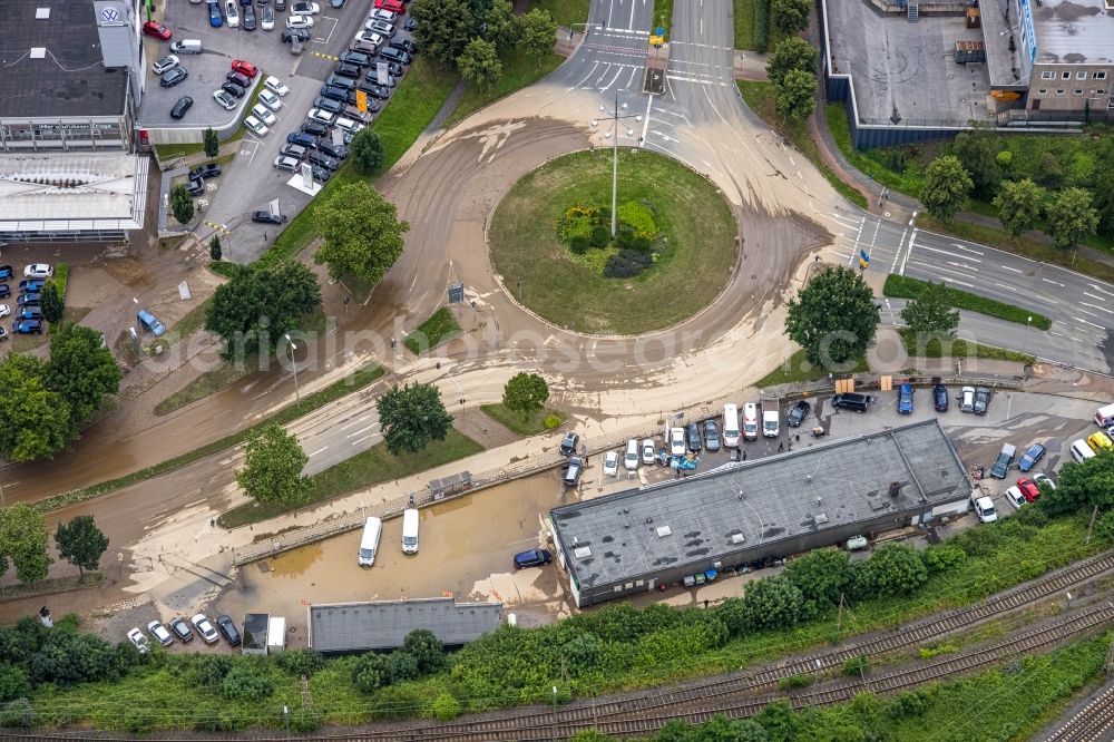 Hagen from the bird's eye view: Flood situation and flooding, all-rousing and infrastructure-destroying masses of brown water on the course of the Ruhr and Volme in Hagen at Ruhrgebiet in the state North Rhine-Westphalia, Germany