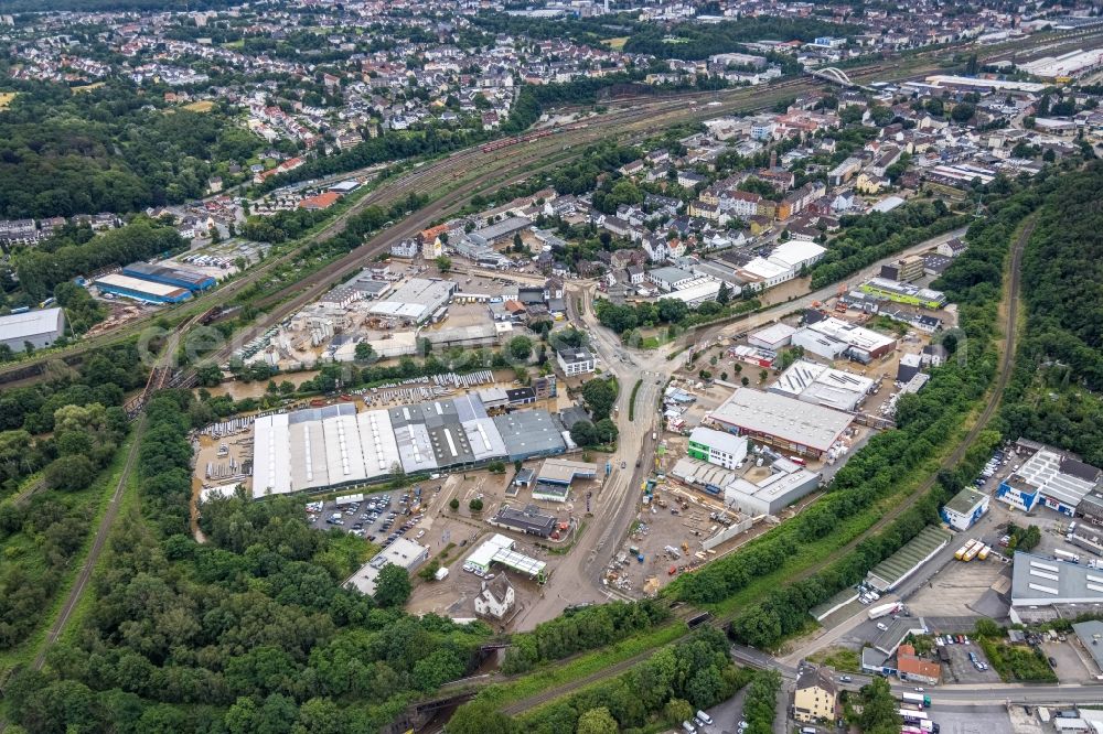 Aerial photograph Hagen - Flood situation and flooding, all-rousing and infrastructure-destroying masses of brown water on the course of the Ruhr and Volme in Hagen at Ruhrgebiet in the state North Rhine-Westphalia, Germany