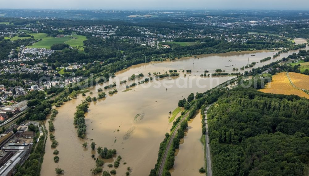 Witten from above - Flood situation and flooding, all-rousing and infrastructure-destroying masses of brown water on the course of the Ruhr in Witten at Ruhrgebiet in the state North Rhine-Westphalia, Germany