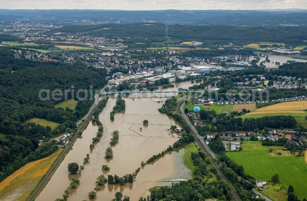 Aerial image Witten - Flood situation and flooding, all-rousing and infrastructure-destroying masses of brown water on the course of the Ruhr in Witten at Ruhrgebiet in the state North Rhine-Westphalia, Germany