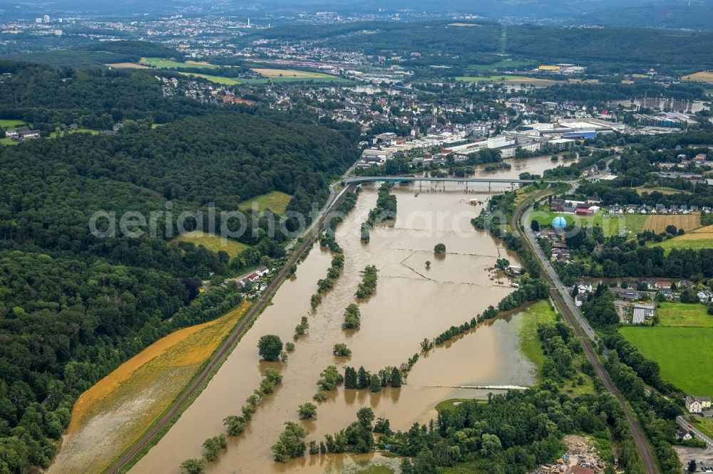 Aerial photograph Witten - Flood situation and flooding, all-rousing and infrastructure-destroying masses of brown water on the course of the Ruhr in Witten at Ruhrgebiet in the state North Rhine-Westphalia, Germany