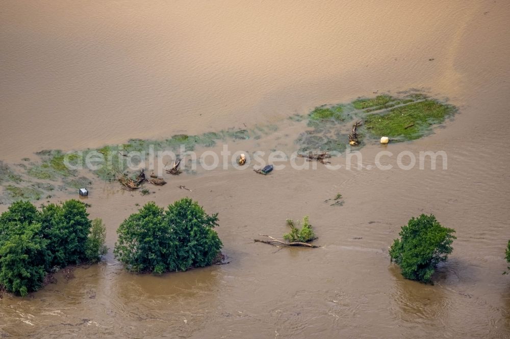 Witten from the bird's eye view: Flood situation and flooding, all-rousing and infrastructure-destroying masses of brown water on the course of the Ruhr in Witten at Ruhrgebiet in the state North Rhine-Westphalia, Germany