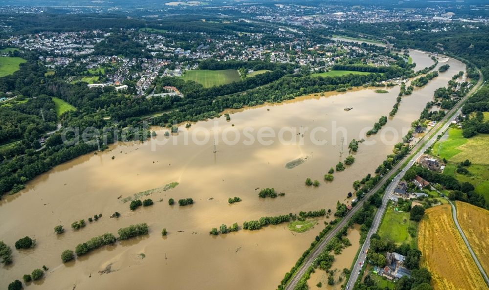 Aerial image Witten - Flood situation and flooding, all-rousing and infrastructure-destroying masses of brown water on the course of the Ruhr in Witten at Ruhrgebiet in the state North Rhine-Westphalia, Germany