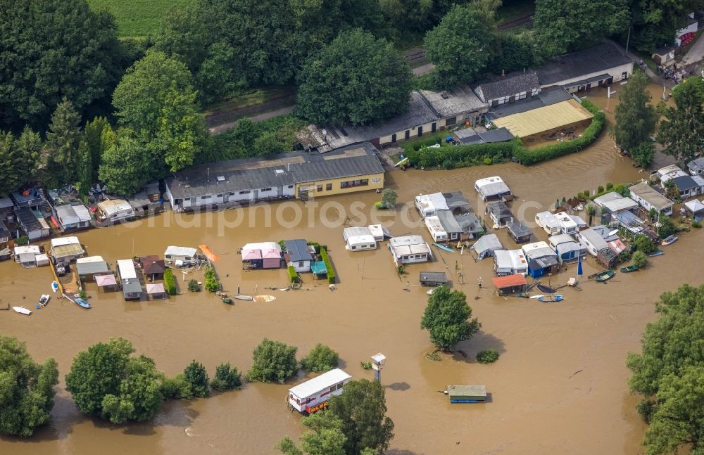 Aerial image Witten - Flood situation and flooding, all-rousing and infrastructure-destroying masses of brown water on the course of the Ruhr in Witten at Ruhrgebiet in the state North Rhine-Westphalia, Germany