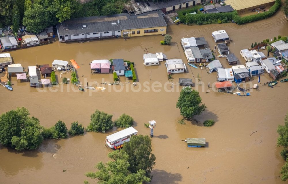 Aerial photograph Witten - Flood situation and flooding, all-rousing and infrastructure-destroying masses of brown water on the course of the Ruhr in Witten at Ruhrgebiet in the state North Rhine-Westphalia, Germany