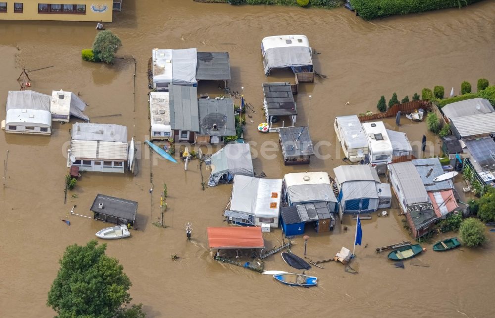 Witten from above - Flood situation and flooding, all-rousing and infrastructure-destroying masses of brown water on the course of the Ruhr in Witten at Ruhrgebiet in the state North Rhine-Westphalia, Germany