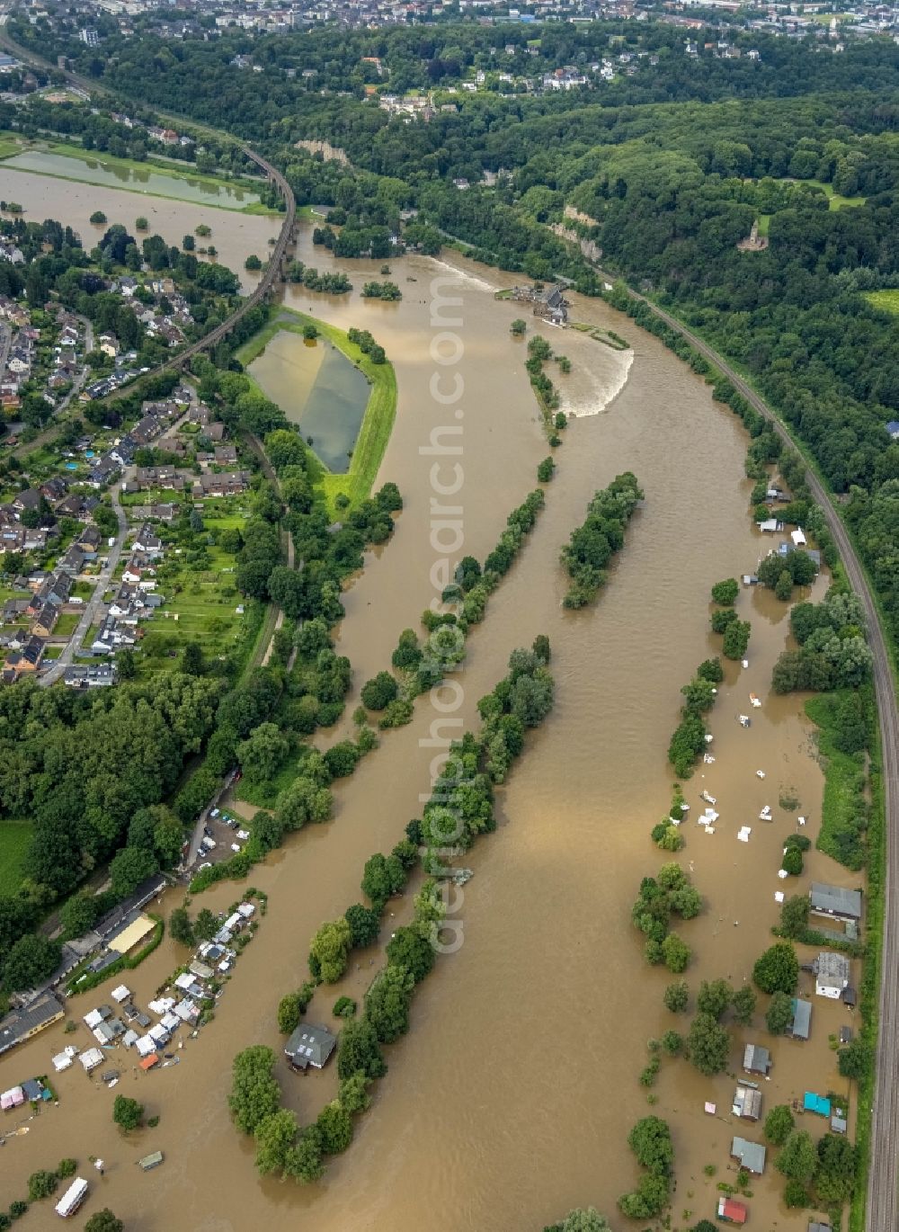 Aerial photograph Witten - Flood situation and flooding, all-rousing and infrastructure-destroying masses of brown water on the course of the Ruhr in Witten at Ruhrgebiet in the state North Rhine-Westphalia, Germany