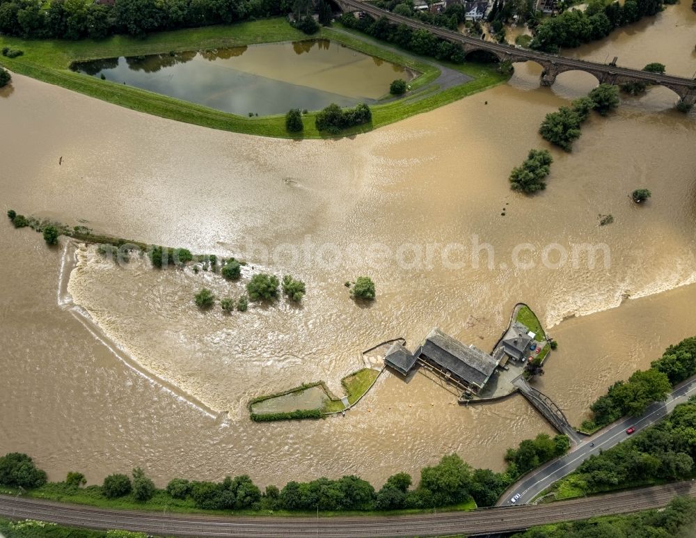 Witten from above - Flood situation and flooding, all-rousing and infrastructure-destroying masses of brown water on the course of the Ruhr in Witten at Ruhrgebiet in the state North Rhine-Westphalia, Germany