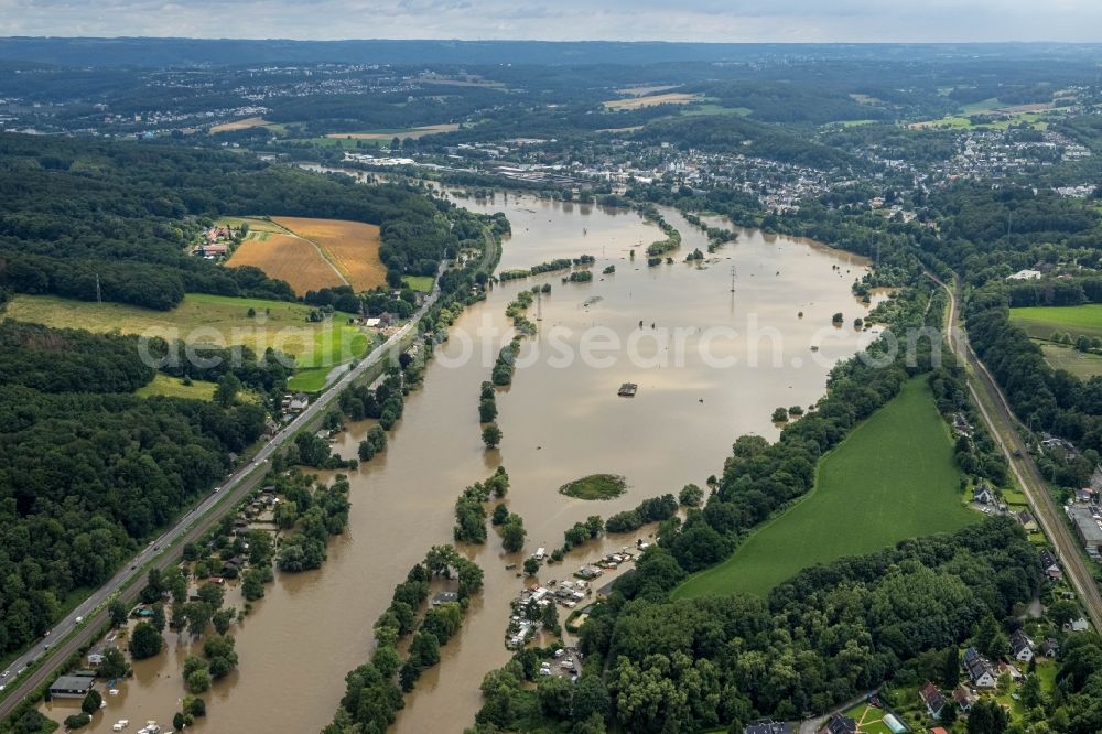 Aerial image Witten - Flood situation and flooding, all-rousing and infrastructure-destroying masses of brown water on the course of the Ruhr in Witten at Ruhrgebiet in the state North Rhine-Westphalia, Germany