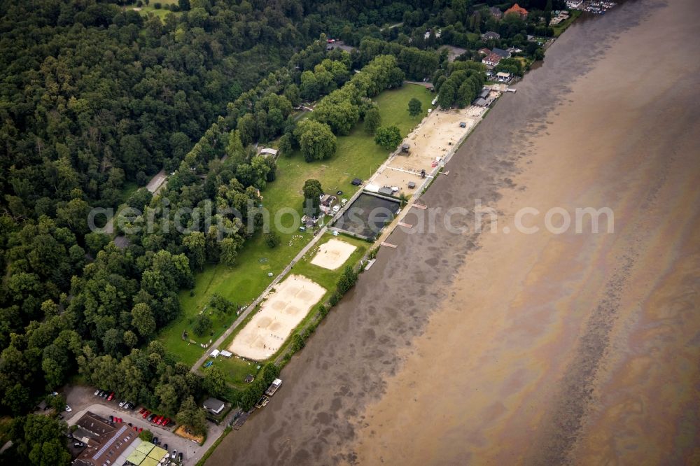 Aerial image Essen - Flood situation of the inundating, all-moving and infrastructure-destroying brown water masses with extensive oil spill on the water surface of the Baldeneysee in the district Bredeney in Essen in the Ruhr area in the state North Rhine-Westphalia, Germany