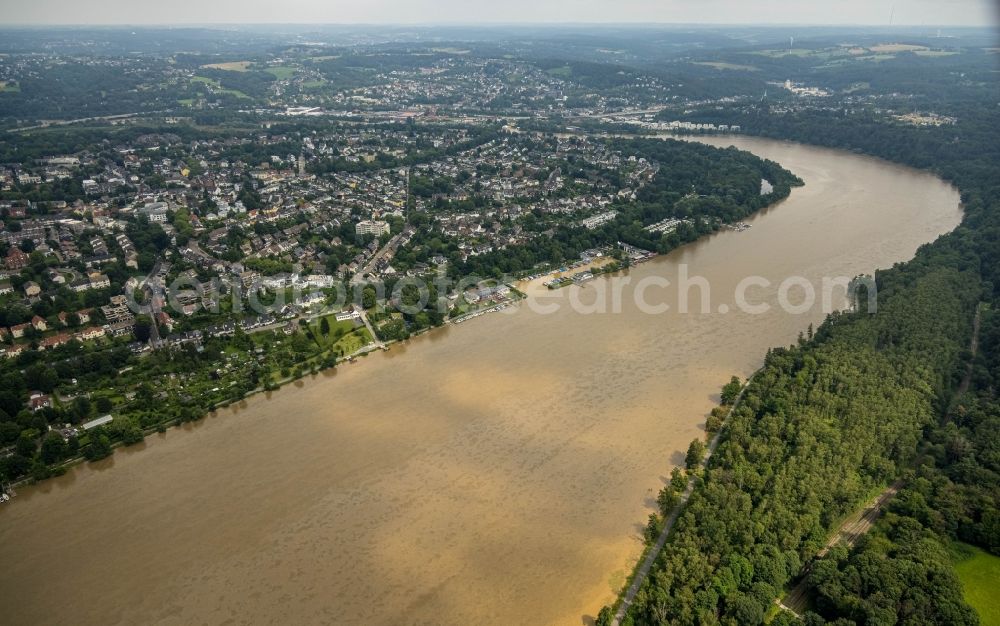 Essen from the bird's eye view: Flood situation of the inundating, all-moving and infrastructure-destroying brown water masses with extensive oil spill on the water surface of the Baldeneysee in the district Bredeney in Essen in the Ruhr area in the state North Rhine-Westphalia, Germany