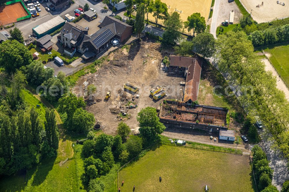 Dortmund from the bird's eye view: Ruins of Hof Schulte-Somborn, a farmstead and farm outbuilding with fire and fire damage on Somborner Strasse in the district of Somborn in Dortmund in the Ruhr area in the federal state of North Rhine-Westphalia, Germany