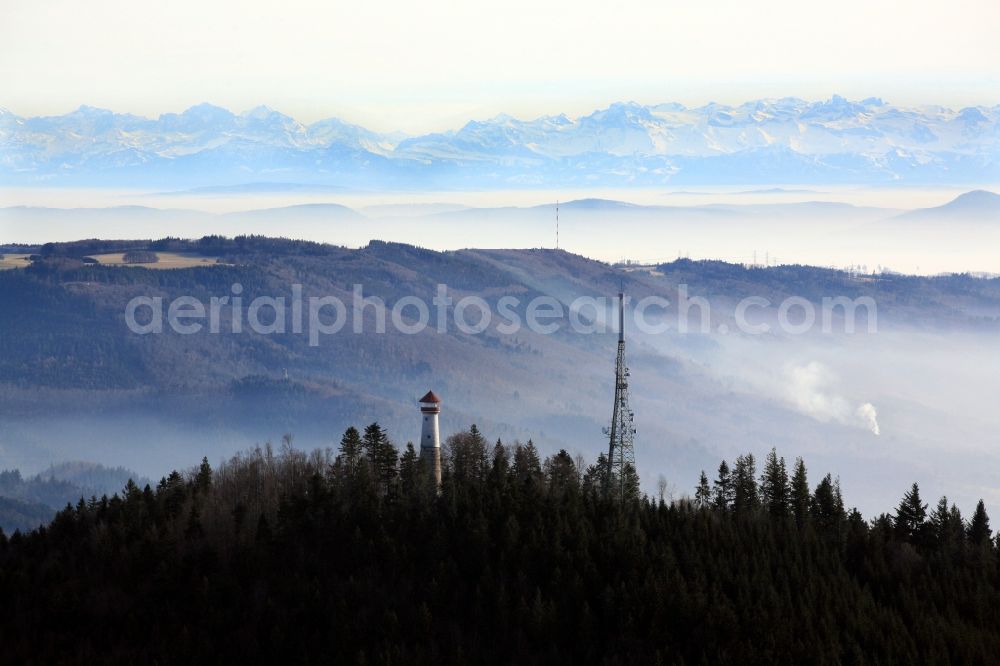 Schopfheim from the bird's eye view: View over the Black Forest with panoramic mountain High Moehr in Schopfheim in Baden-Wuerttemberg. In between projects out of the haze of the ridge Hotzenwald