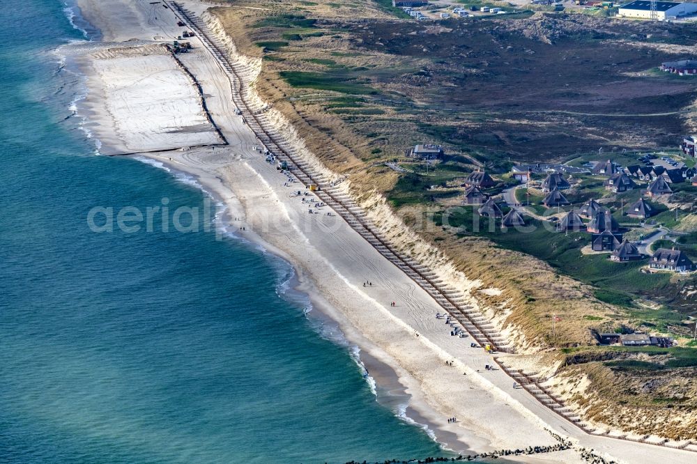 Hörnum (Sylt) from above - Wooden groynes row on the surface of the water Tetrapoden seashore in Hoernum (Sylt) on Island Sylt in the state Schleswig-Holstein, Germany