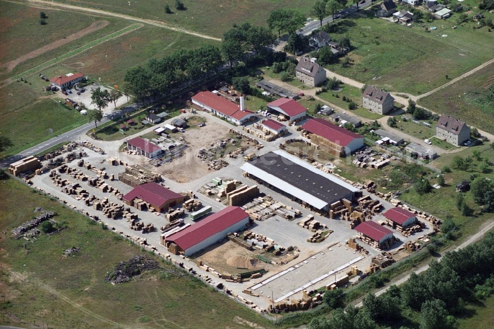 Müncheberg OT Hoppegarten from above - Timber trade sales point at the B1 federal road in the district Hoppegarten of Muencheberg in Brandenburg