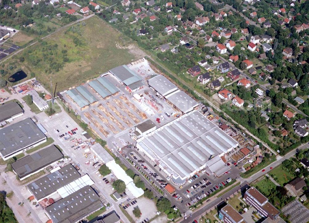 Aerial image Berlin - Mahlsdorf - 20.08.2002 Holzmarkt der Fa. Holz - Possling GmbH & Co. KG an der Landsberger Straße 9 in 12623 BERLIN