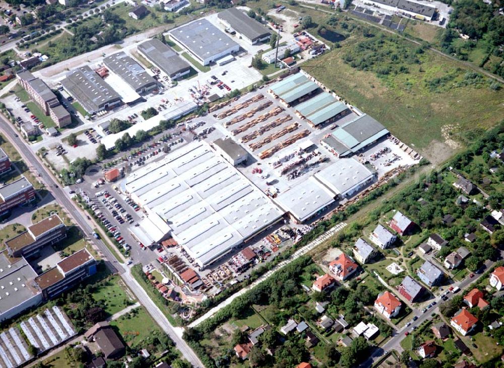 Aerial photograph Berlin - Mahlsdorf - 20.08.2002 Holzmarkt der Fa. Holz - Possling GmbH & Co. KG an der Landsberger Straße 9 in 12623 BERLIN