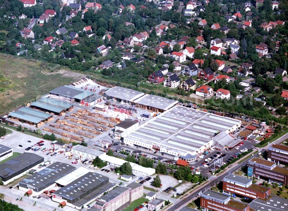 Berlin - Mahlsdorf from the bird's eye view: 20.08.2002 Holzmarkt der Fa. Holz - Possling GmbH & Co. KG an der Landsberger Straße 9 in 12623 BERLIN