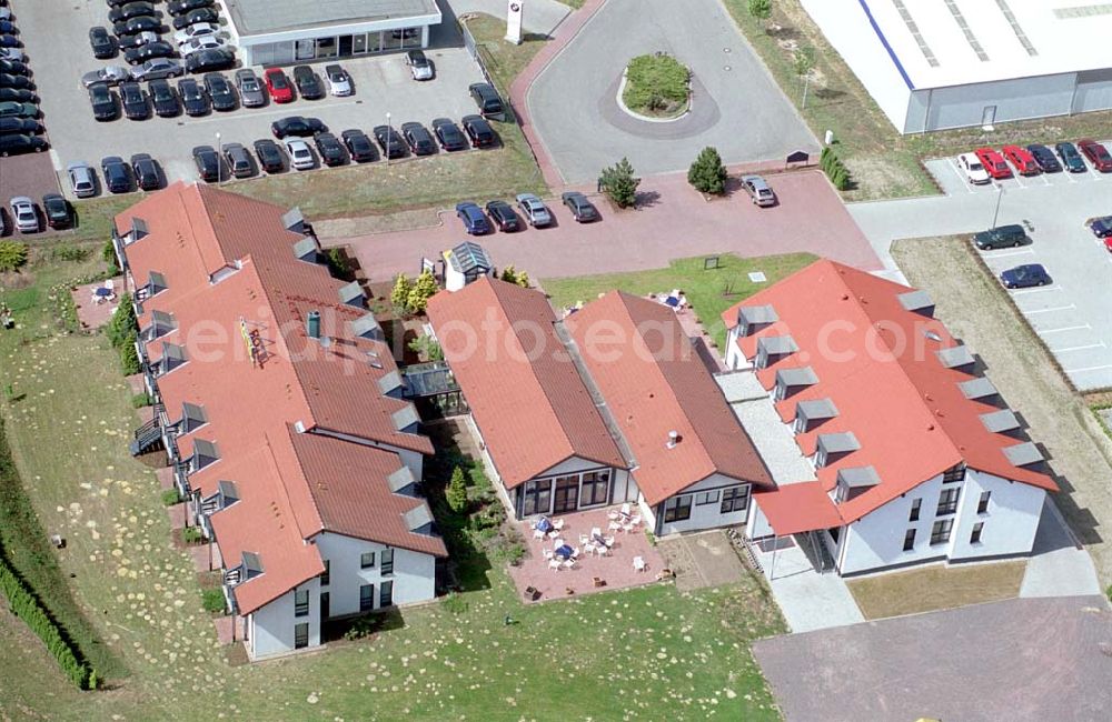 Burg/Sachsen-Anhalt from the bird's eye view: Hotel im Gewerbegebiet Burg-Süd in Sachsen-Anhalt. Hotel u. Restaurant Wittekind GmbH Im neuen Gewerbepark An den Krähenbergen 2 39288 Burg Tel.:0 39 21 / 92 39 - 0 Fax.:0 39 21 / 92 39 - 39