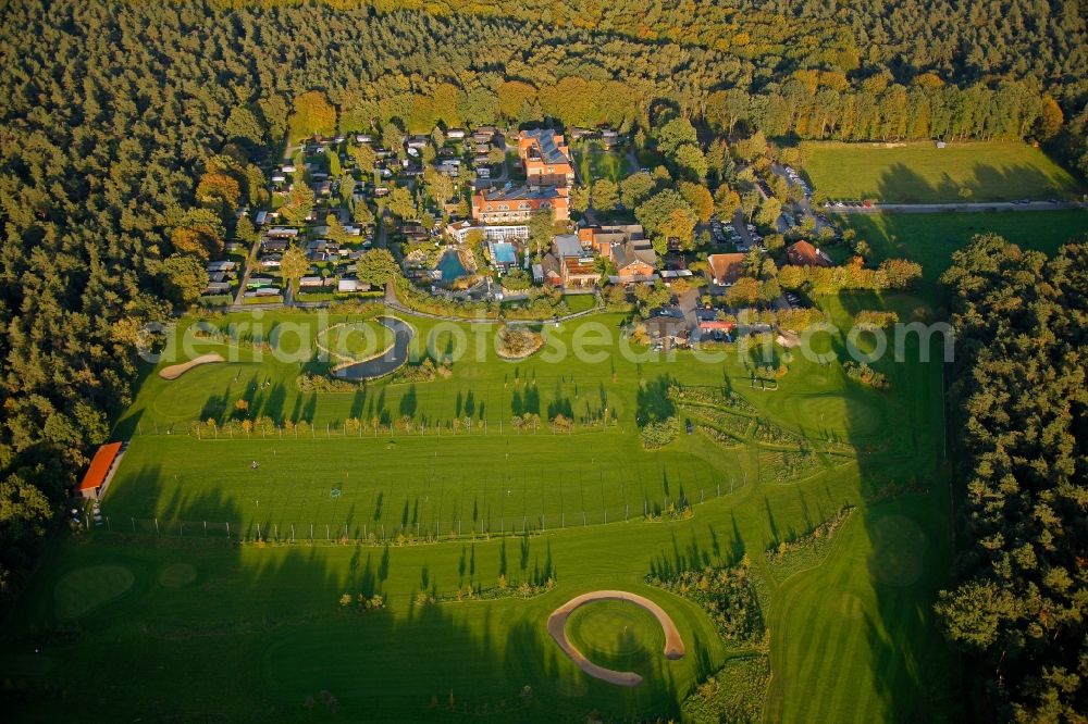 Aerial photograph Datteln - Hotel complex with golf course of Schnieder e.K. in a wooded area in Datteln in North Rhine-Westphalia